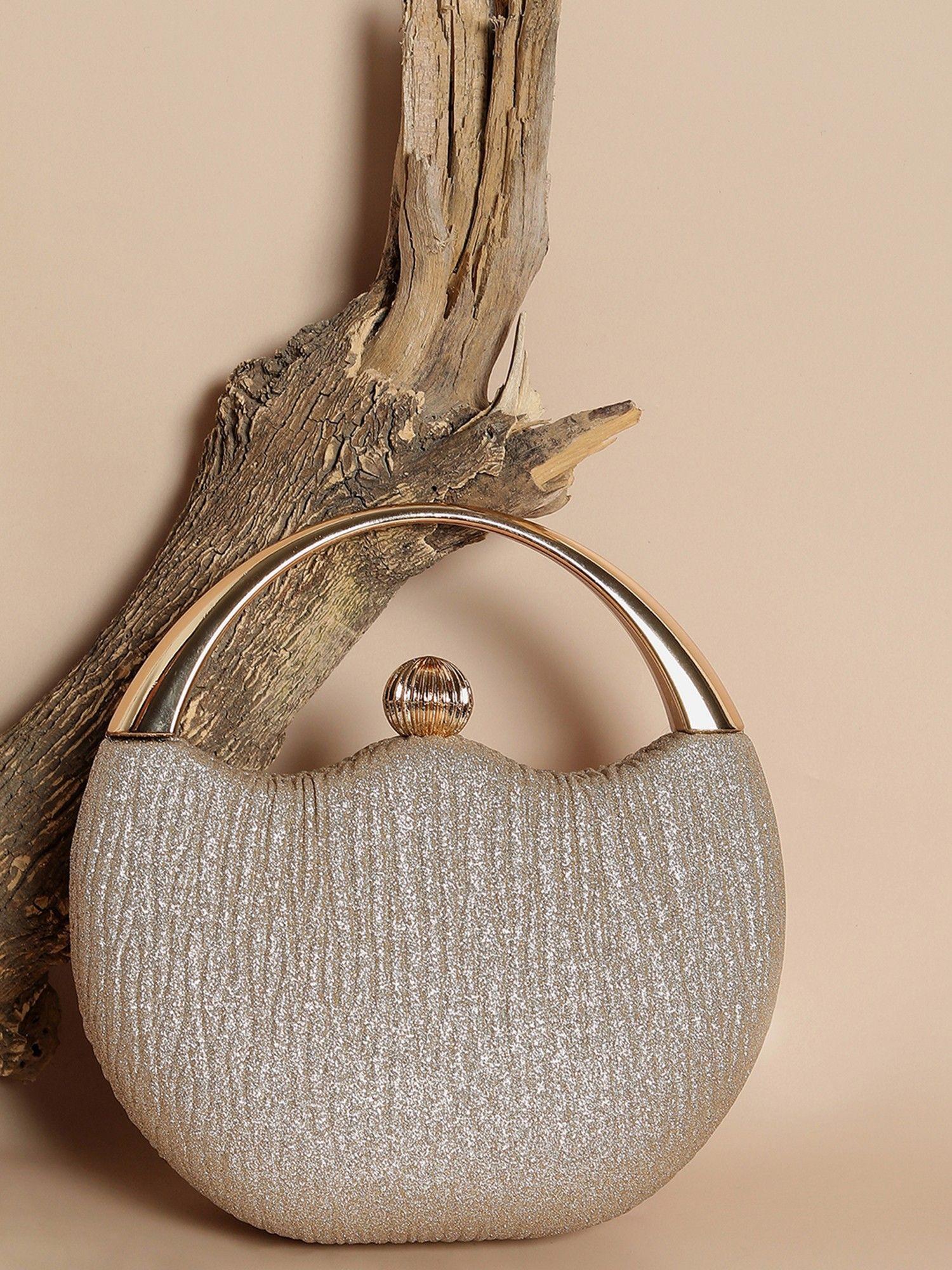 gold textured vegan leather hand bag