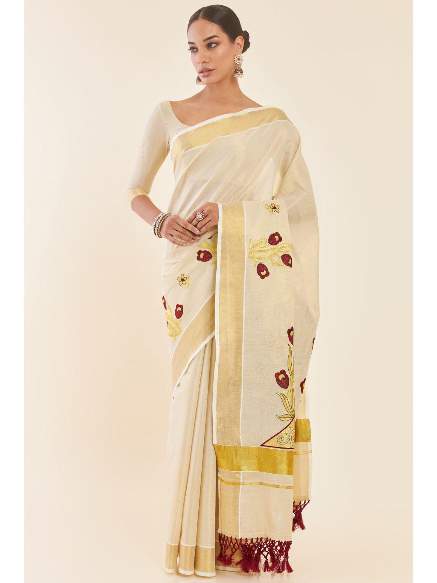 gold tissue saree with floral embroidered design and zari borders with unstitched blouse