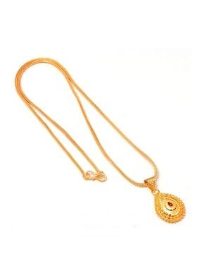 gold-toned chain with pendant locket