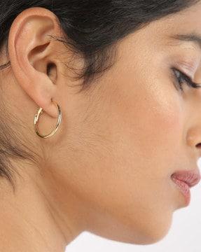 gold-toned hoop earrings