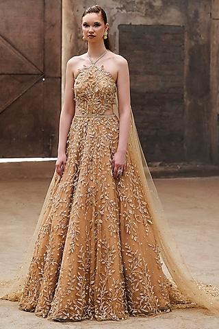gold tulle & satin hand embroidered gown with drapes