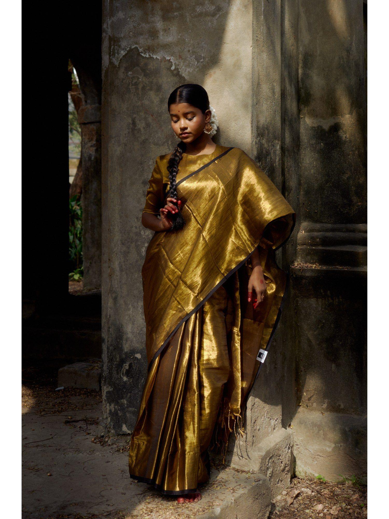 gold with deep black border tissue saree with unstitched blouse