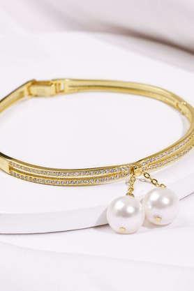 golden dangling pearl bangle bracelet