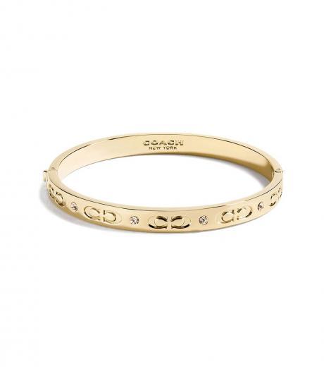 golden kissing c hinged bangle bracelet