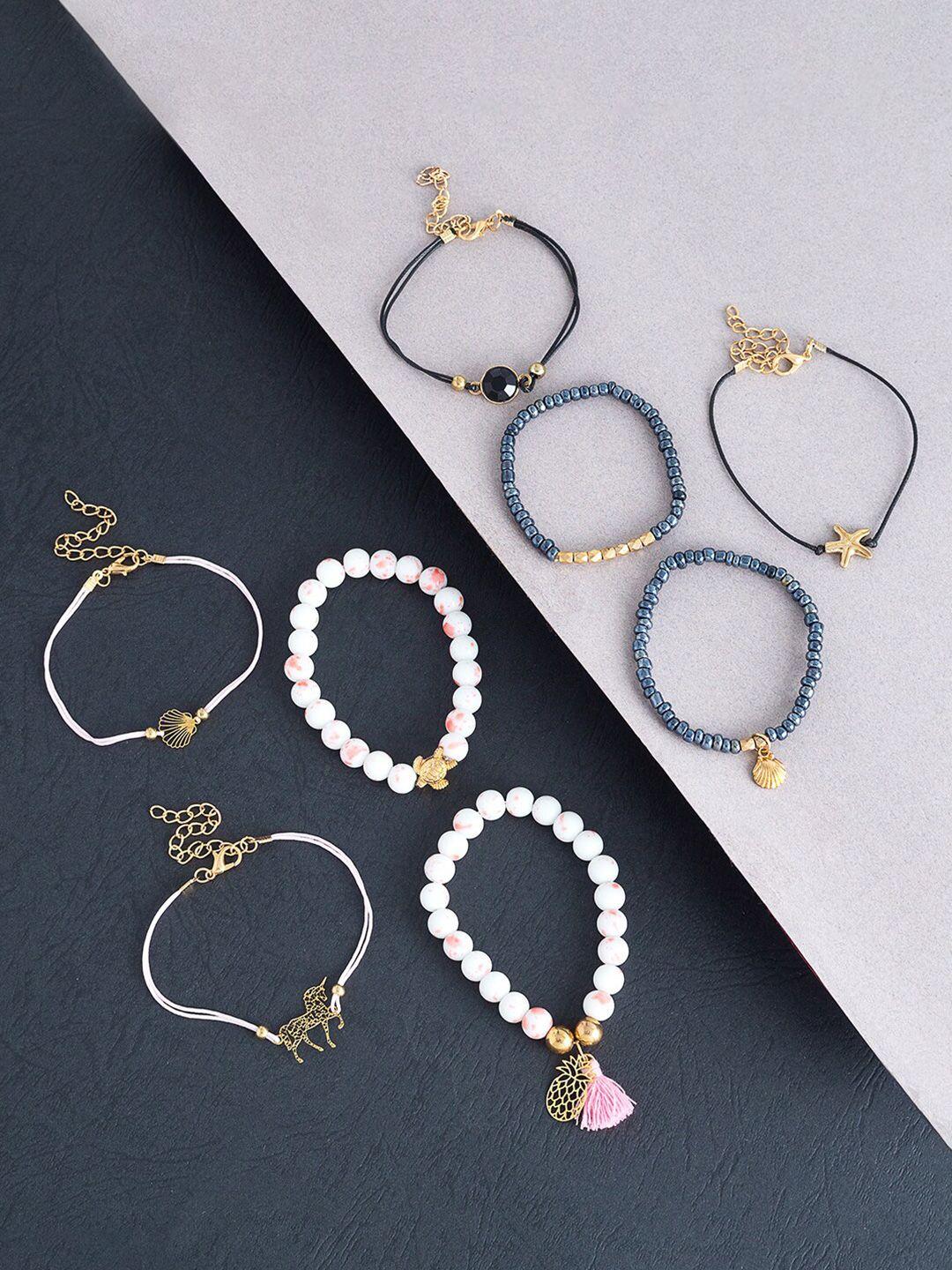 golden peacock women 8pcs black & white bracelet