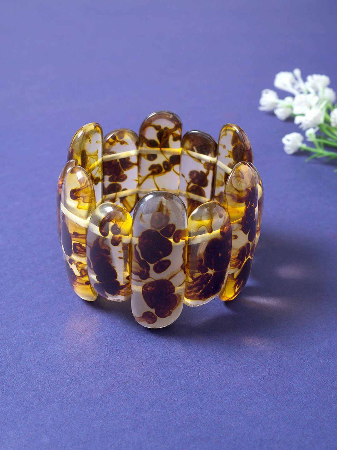 golden peacock women brown handcrafted elasticated bracelet