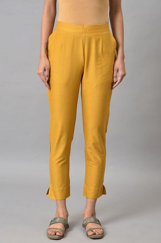 golden yellow solid cotton trousers