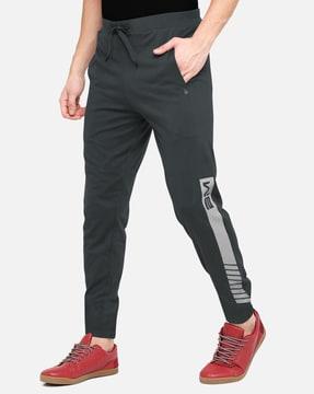 graphic print track pants with insert pockets