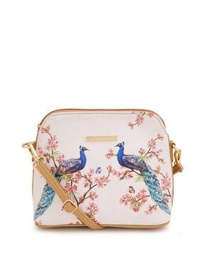 graphic print sling bag with detachable strap