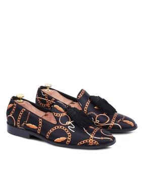 graphic print slip-on shoes
