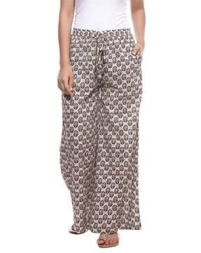 graphic print stretchable flared palazzos