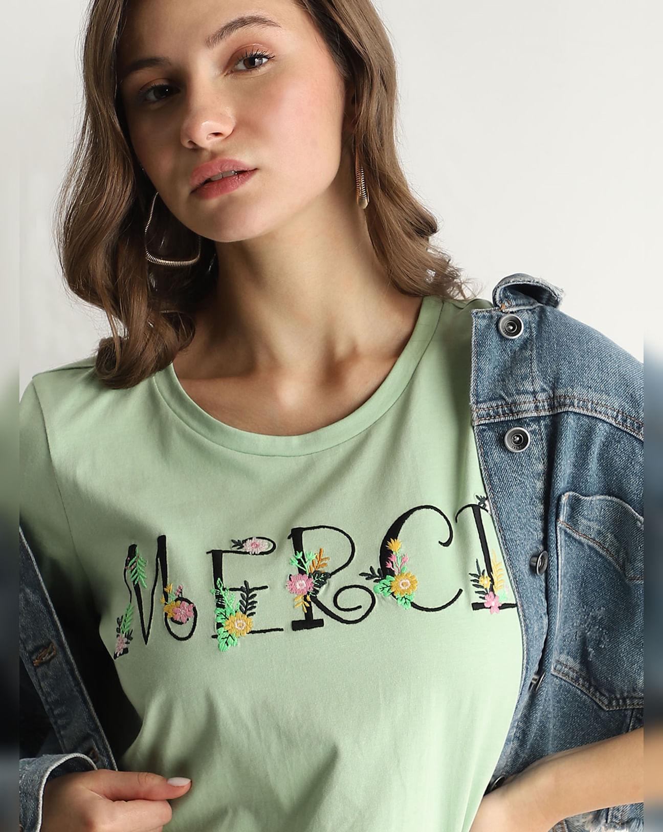 green embroidered text t-shirt