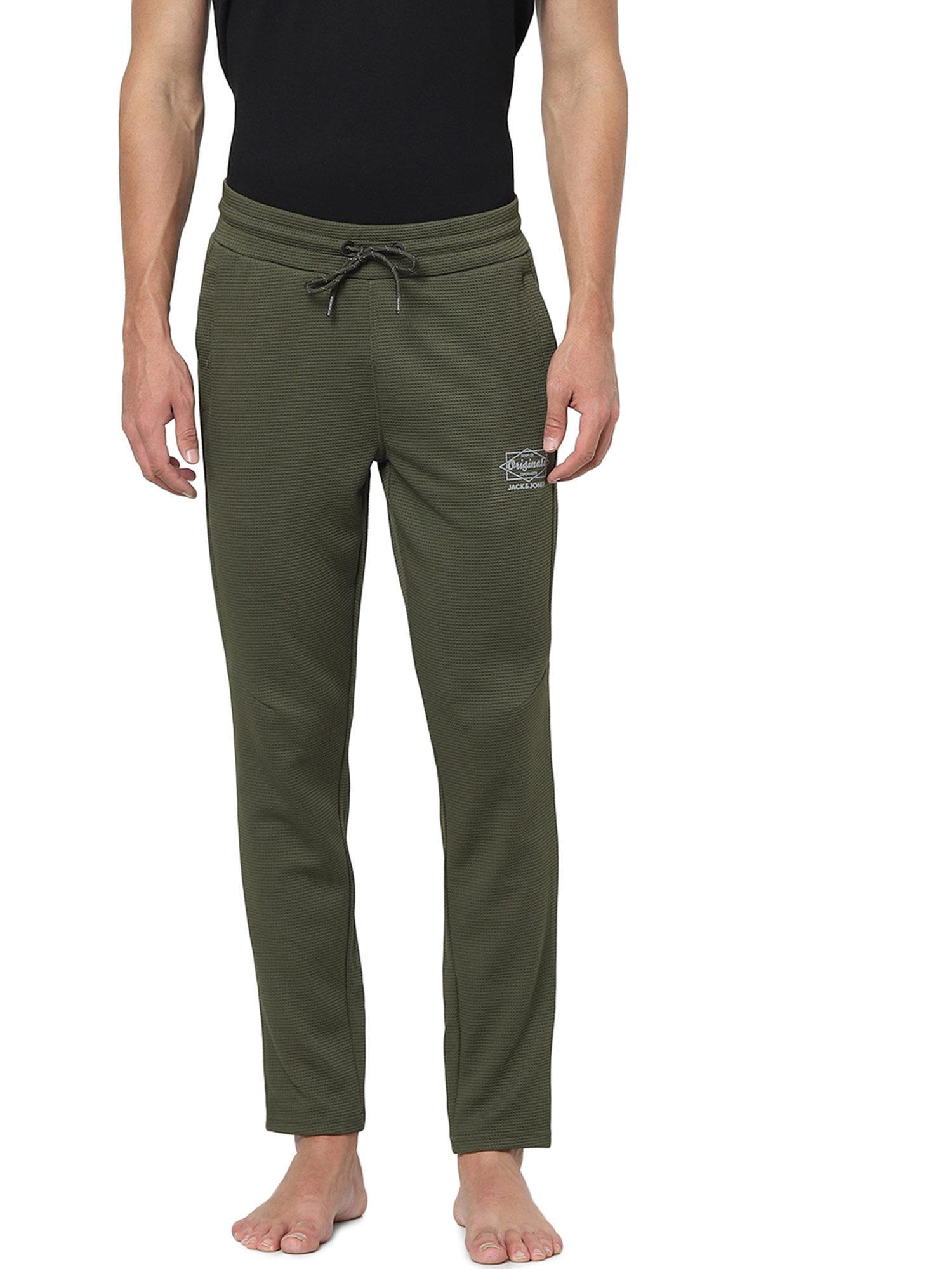 green mid rise textured trackpants