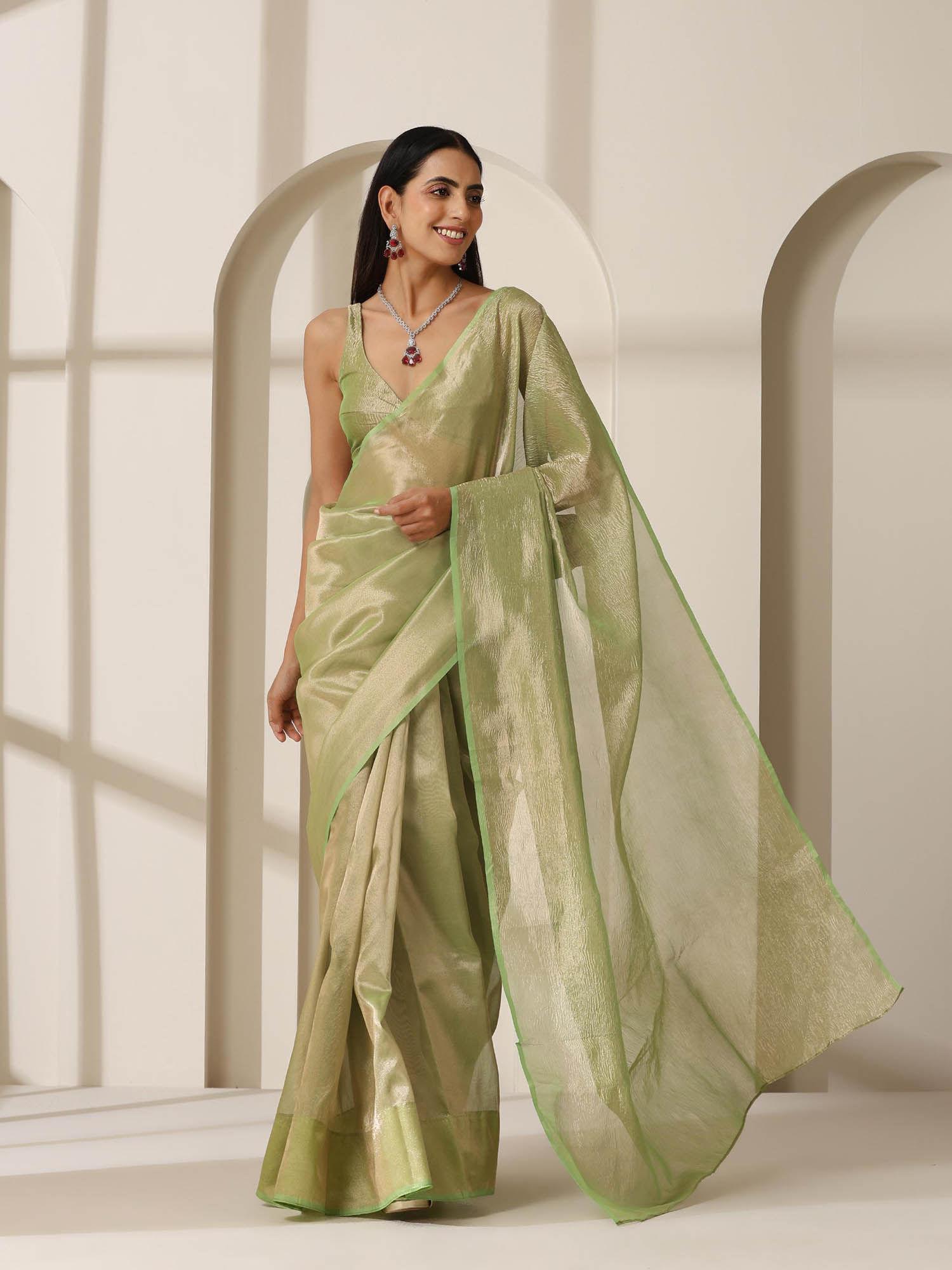 green banarasi tissue saree with crushed pallu and unstitched blouse