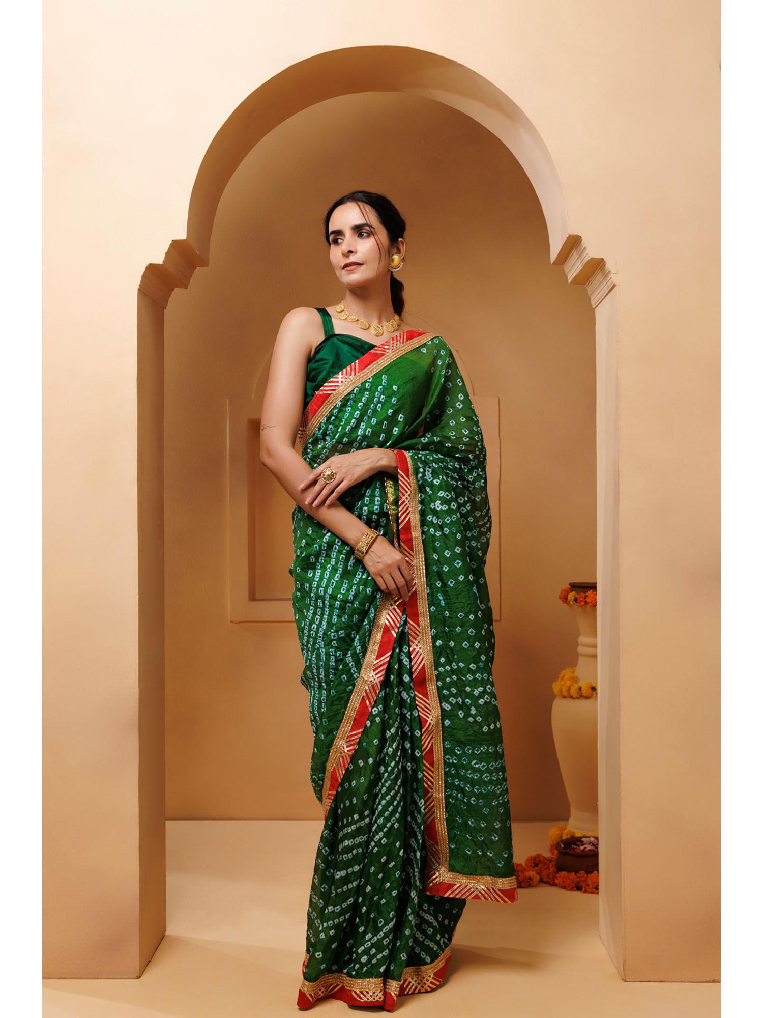 green bandhani draped silk saree with unstitched blouse