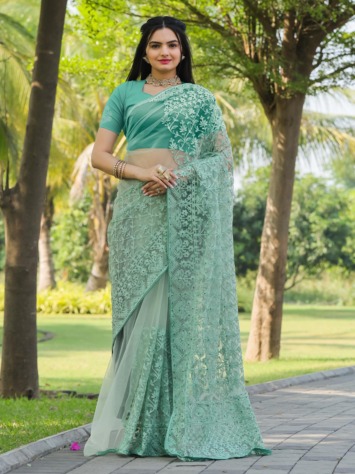 green colored embroidered net saree with unstitched blouse