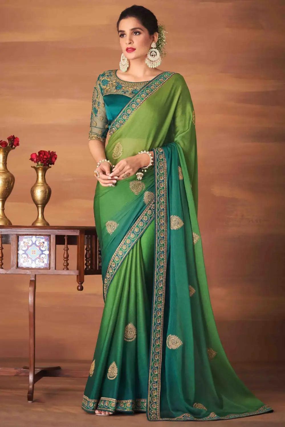 green colour georgette silk saree with embroidery work