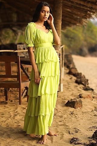 green draped gown with puff sleeves
