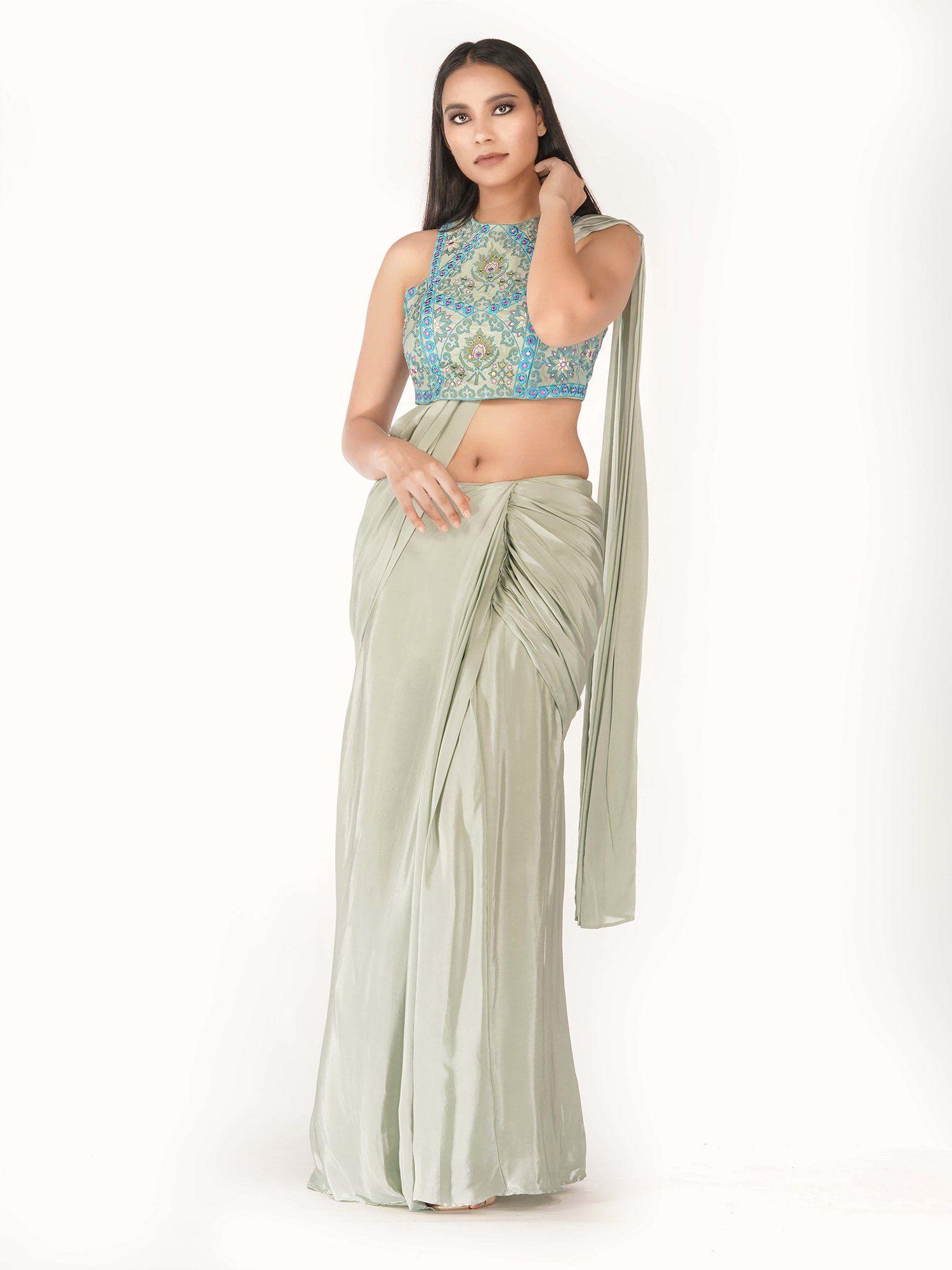 green draped saree with racer blouse with stitched blouse