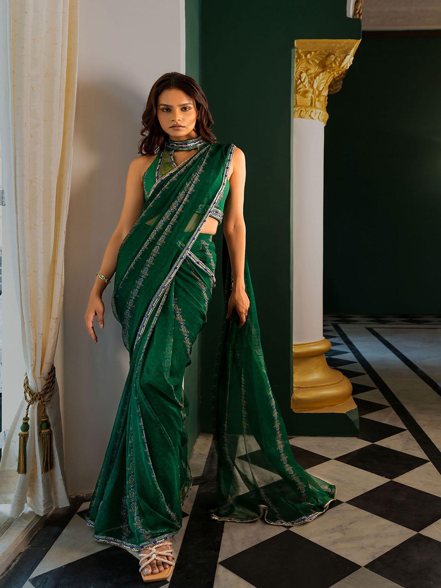 green evil eye saree with halter neck stitched blouse