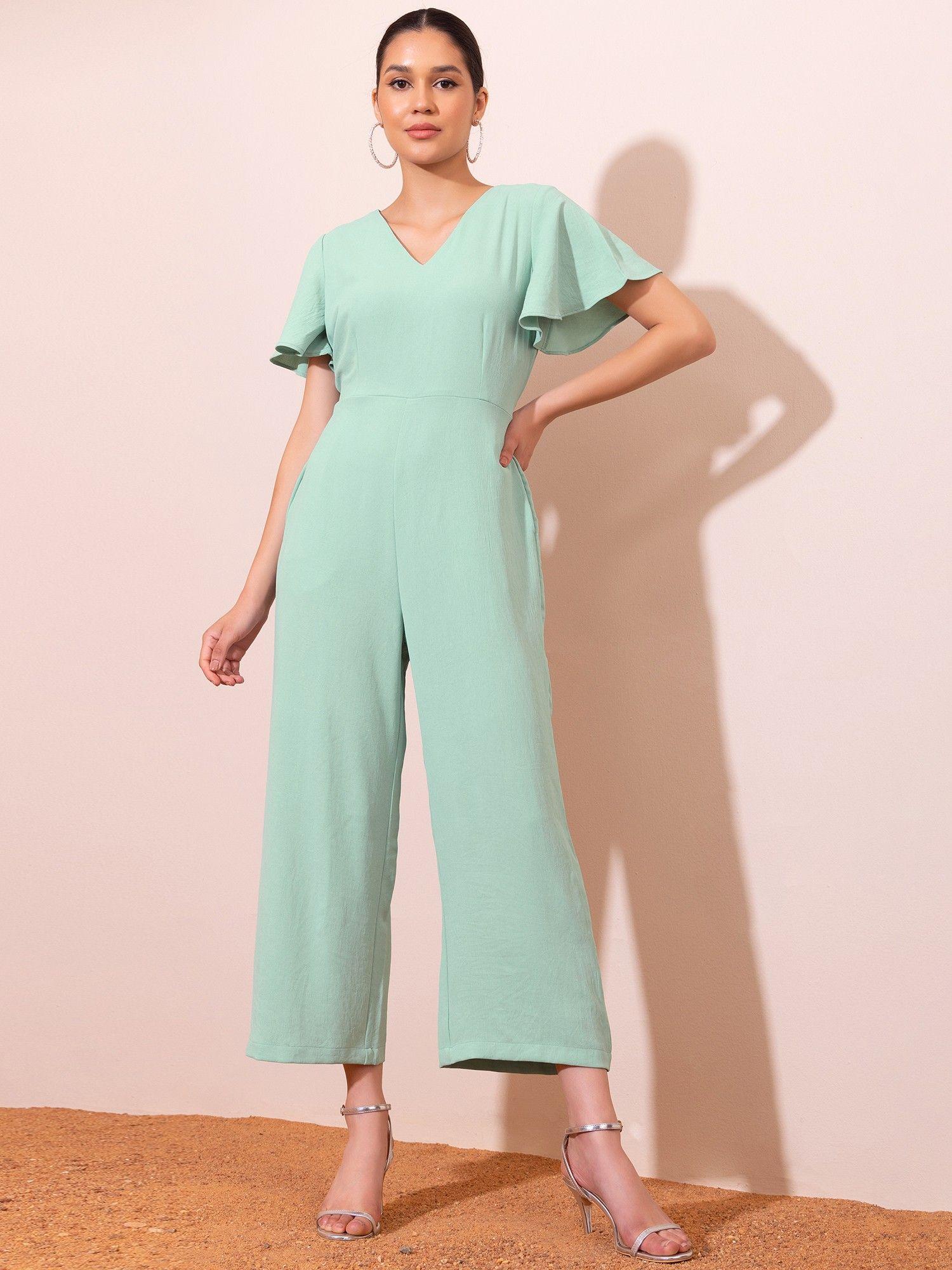 green flared sleeve jumpsuit with attached belt