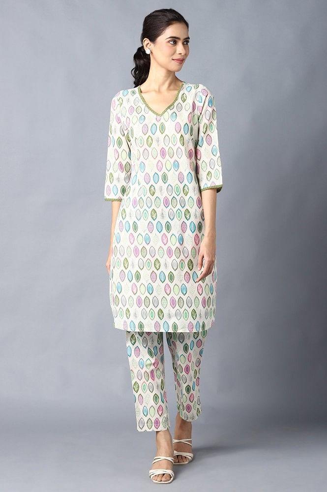 green floral printed v-neck kurta with straight trousers