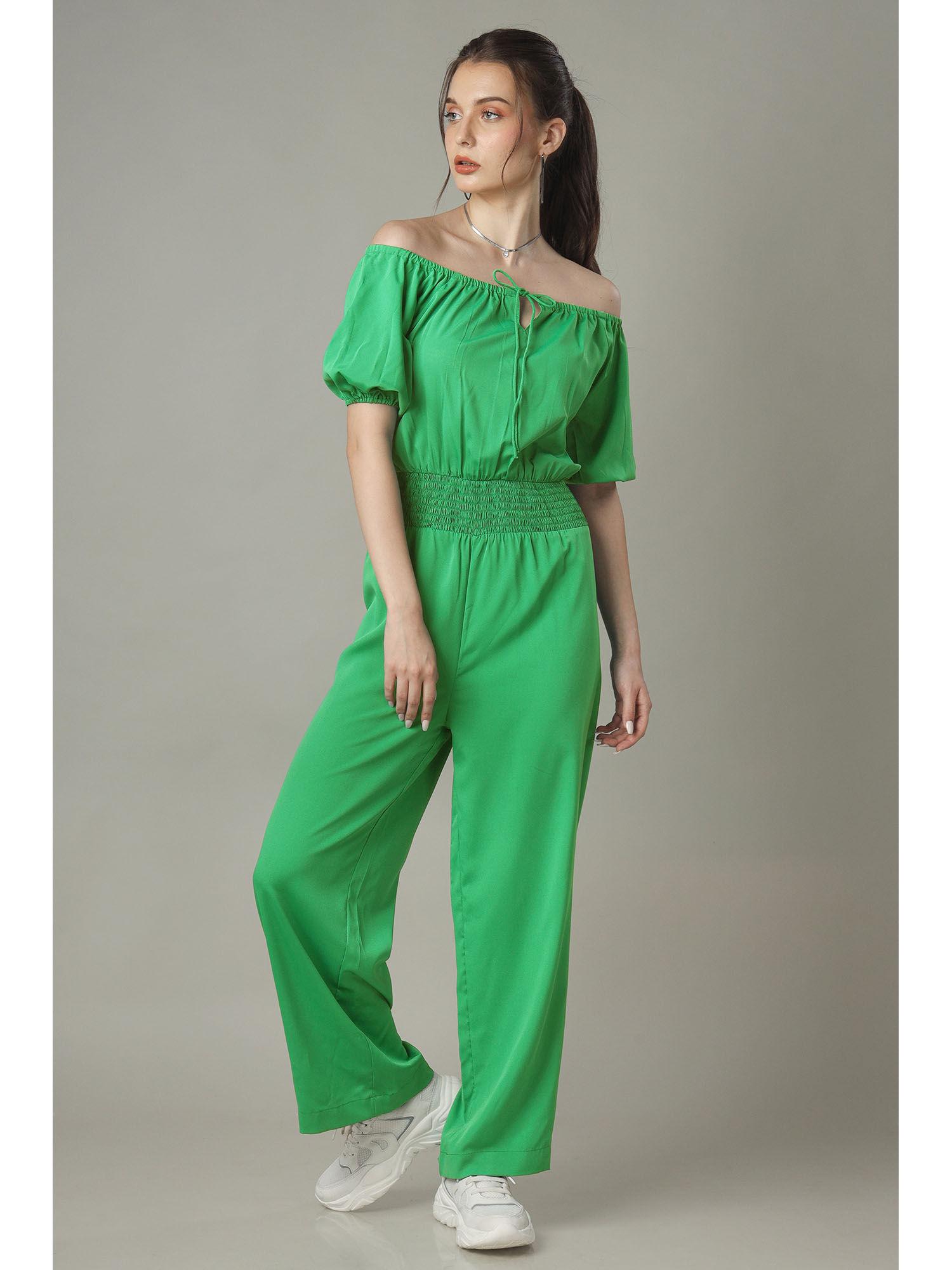 green jumpsuit with smocking detailing off shoulder