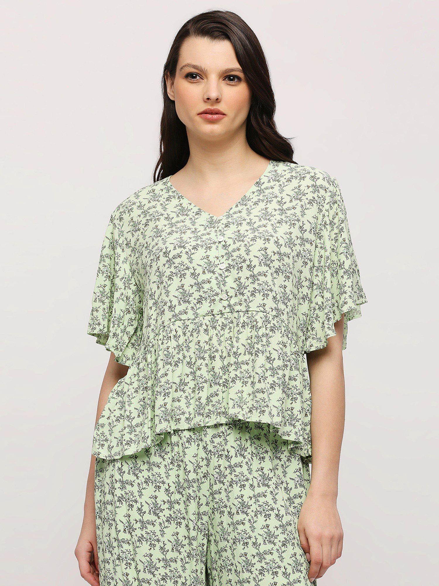 green leaf printed half sleeve peplum top