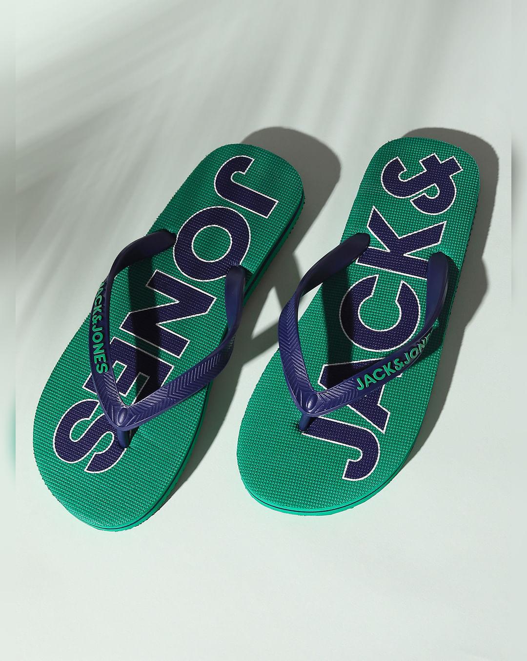 green logo print flip flops