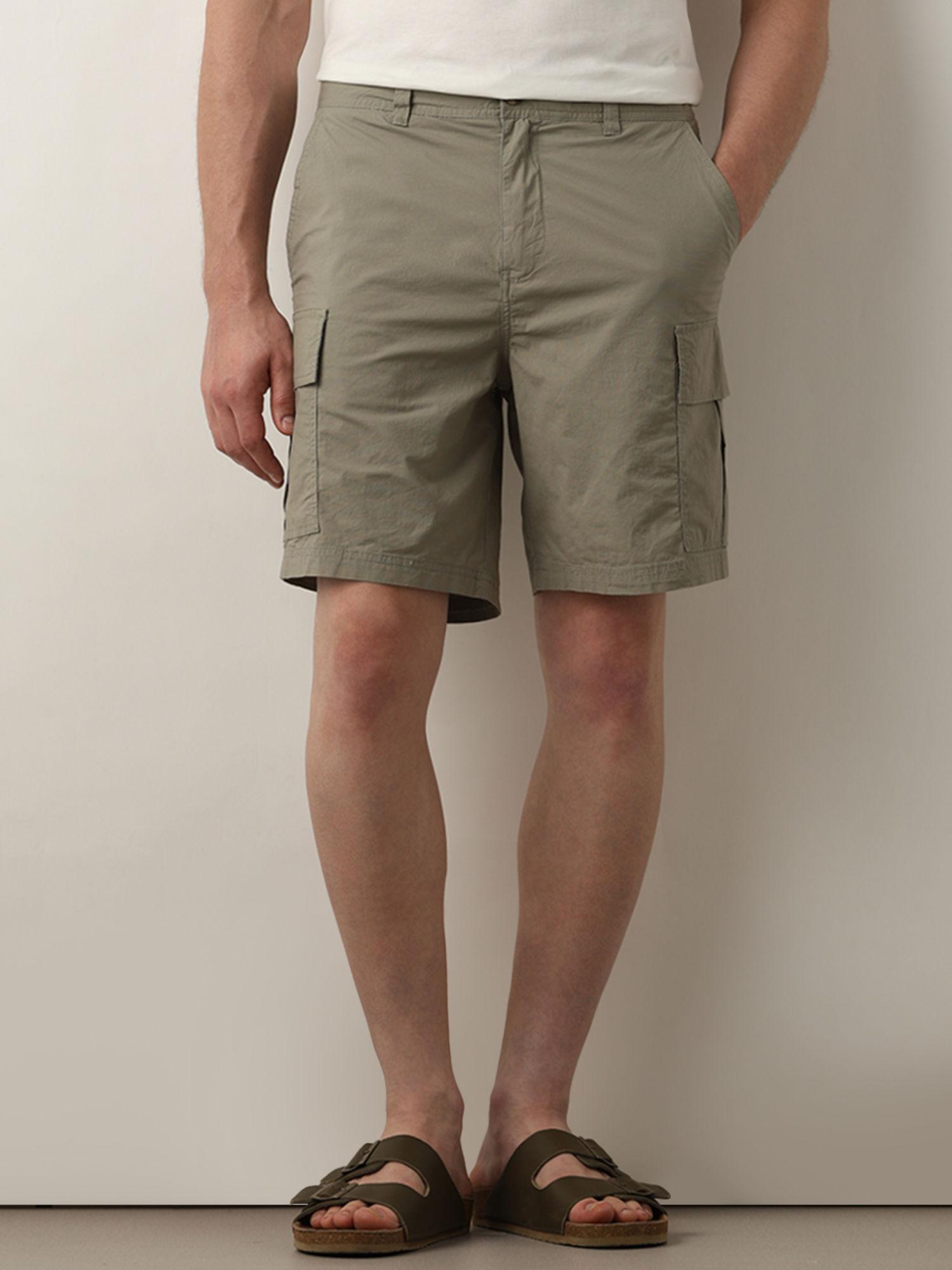 green mid rise cargo shorts