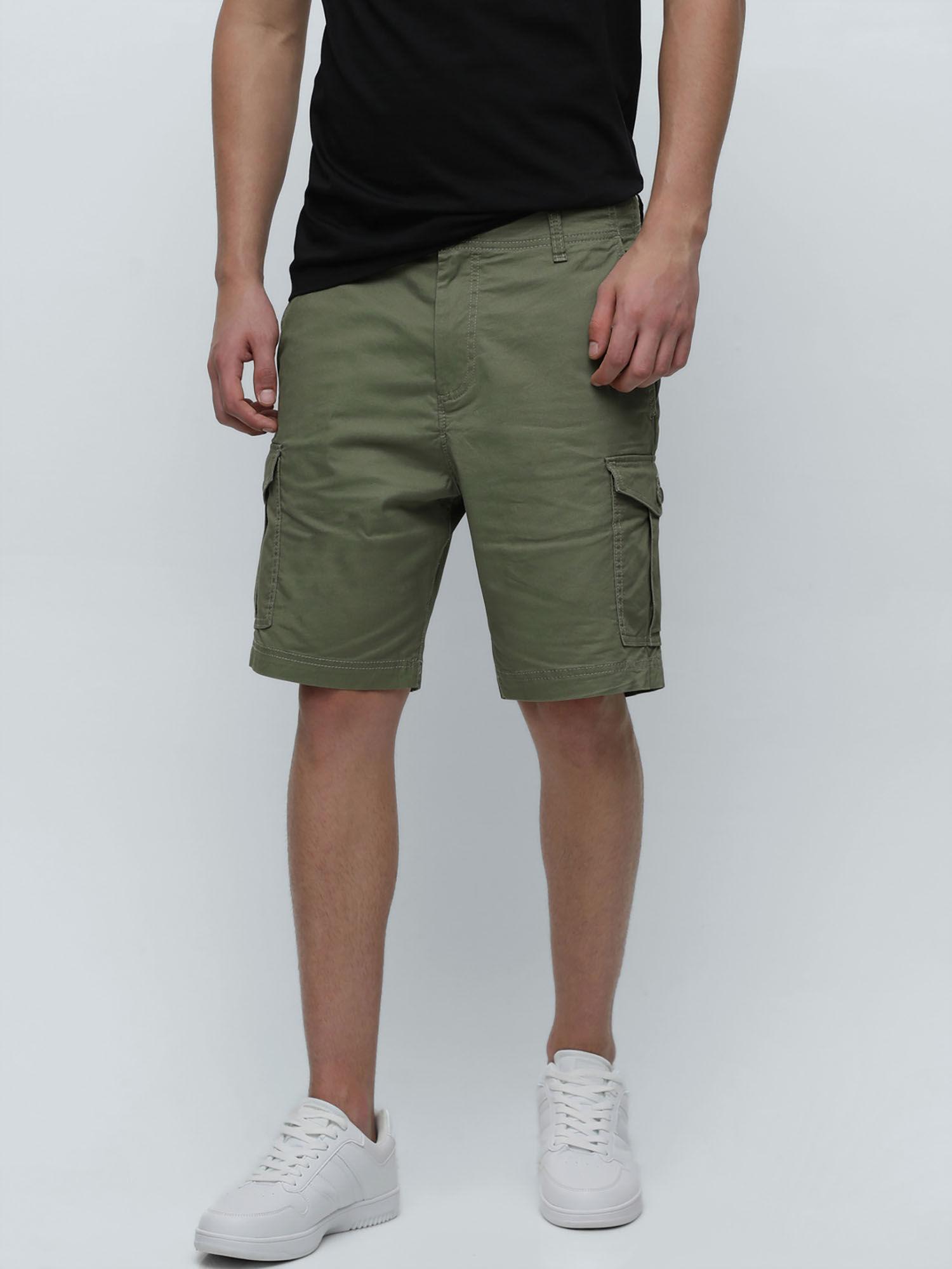 green mid rise cargo shorts