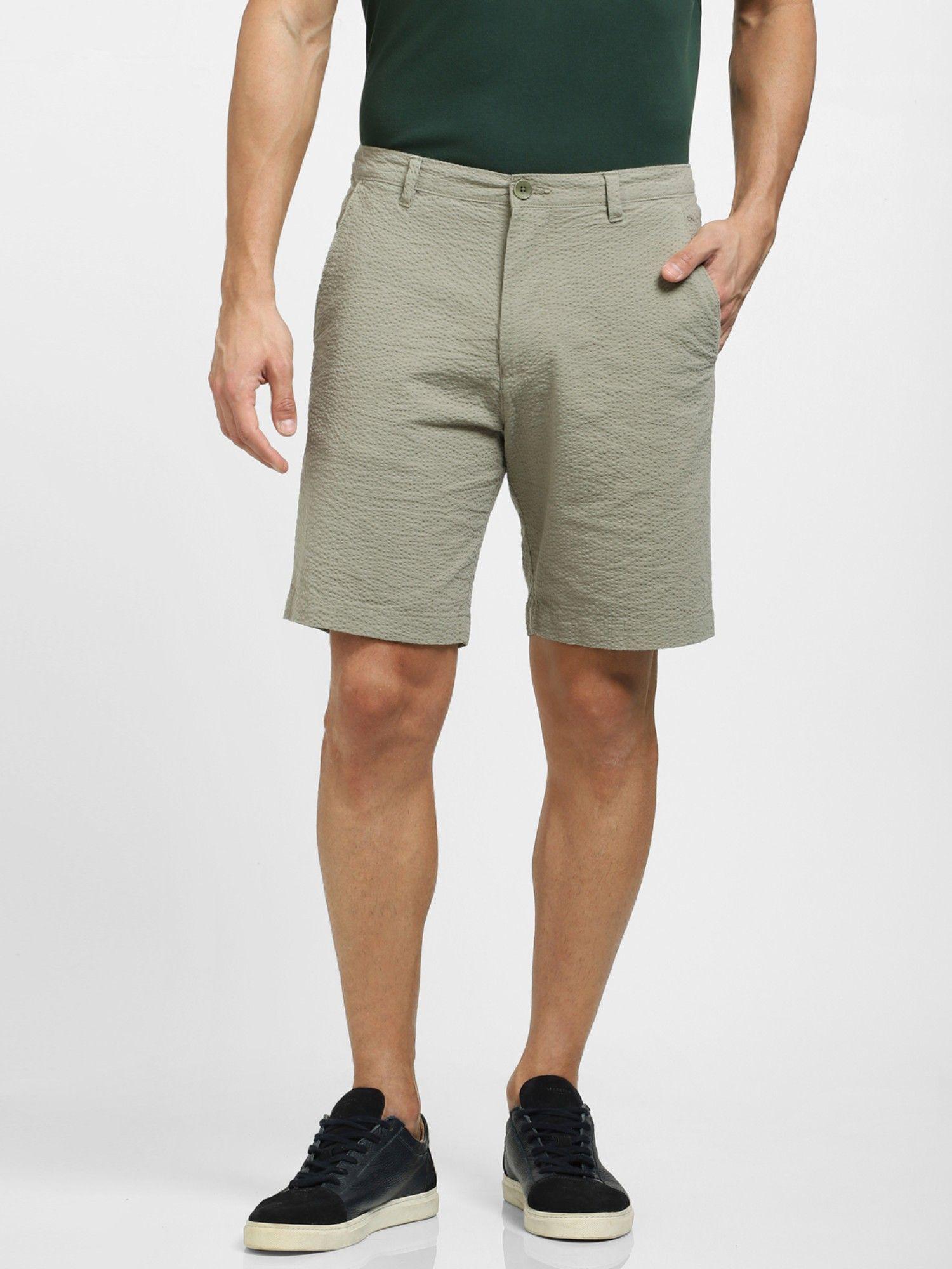 green mid rise shorts
