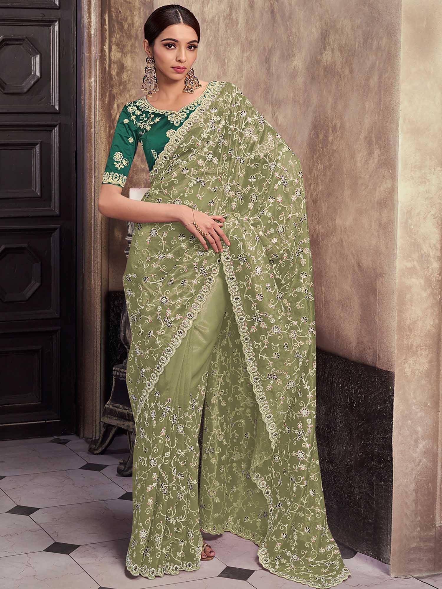 green net embroidered saree with unstitched blouse