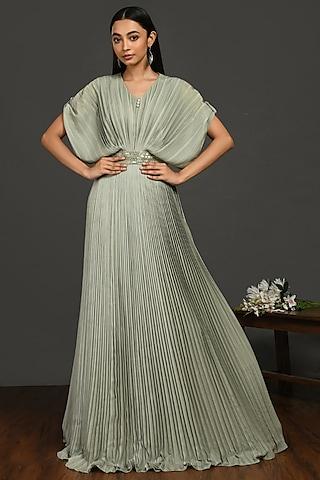 green pleated gown with belt