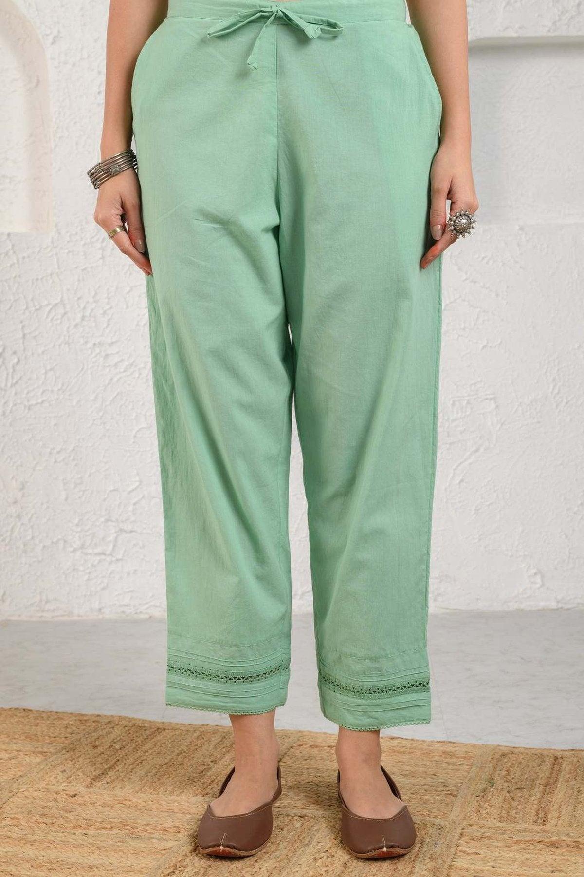 green pleated lace pants