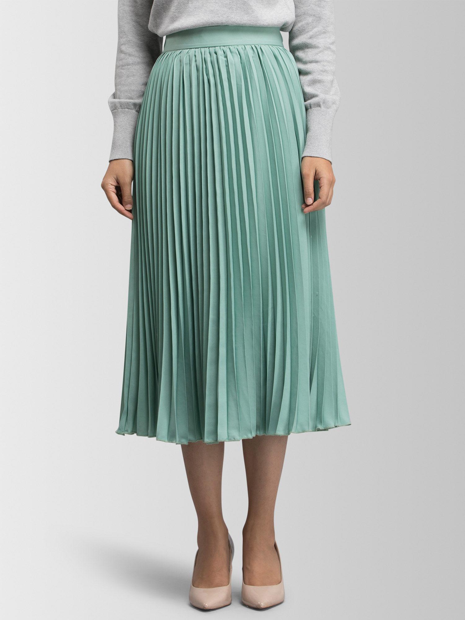 green pleated skirt