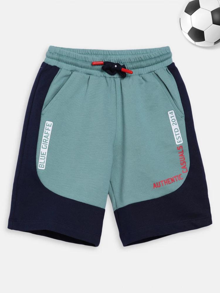 green solid regular fit shorts