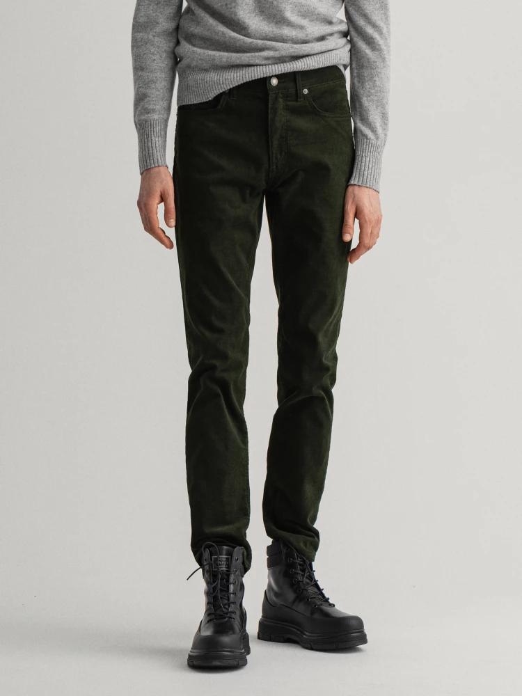 green solid slim fit jeans