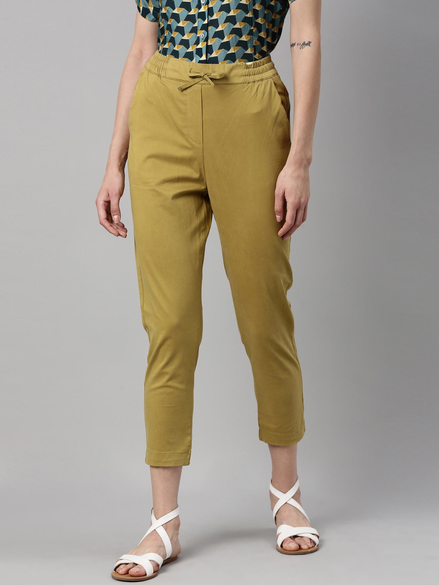 green solid trousers