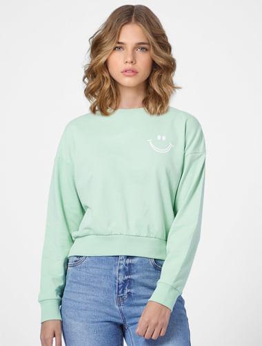 green sweatshirt