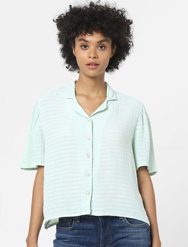 green textured shirt