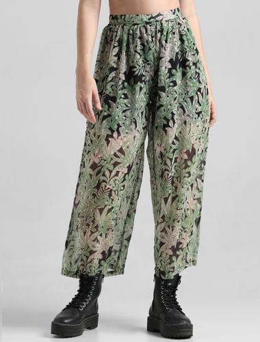 green tropical print pants