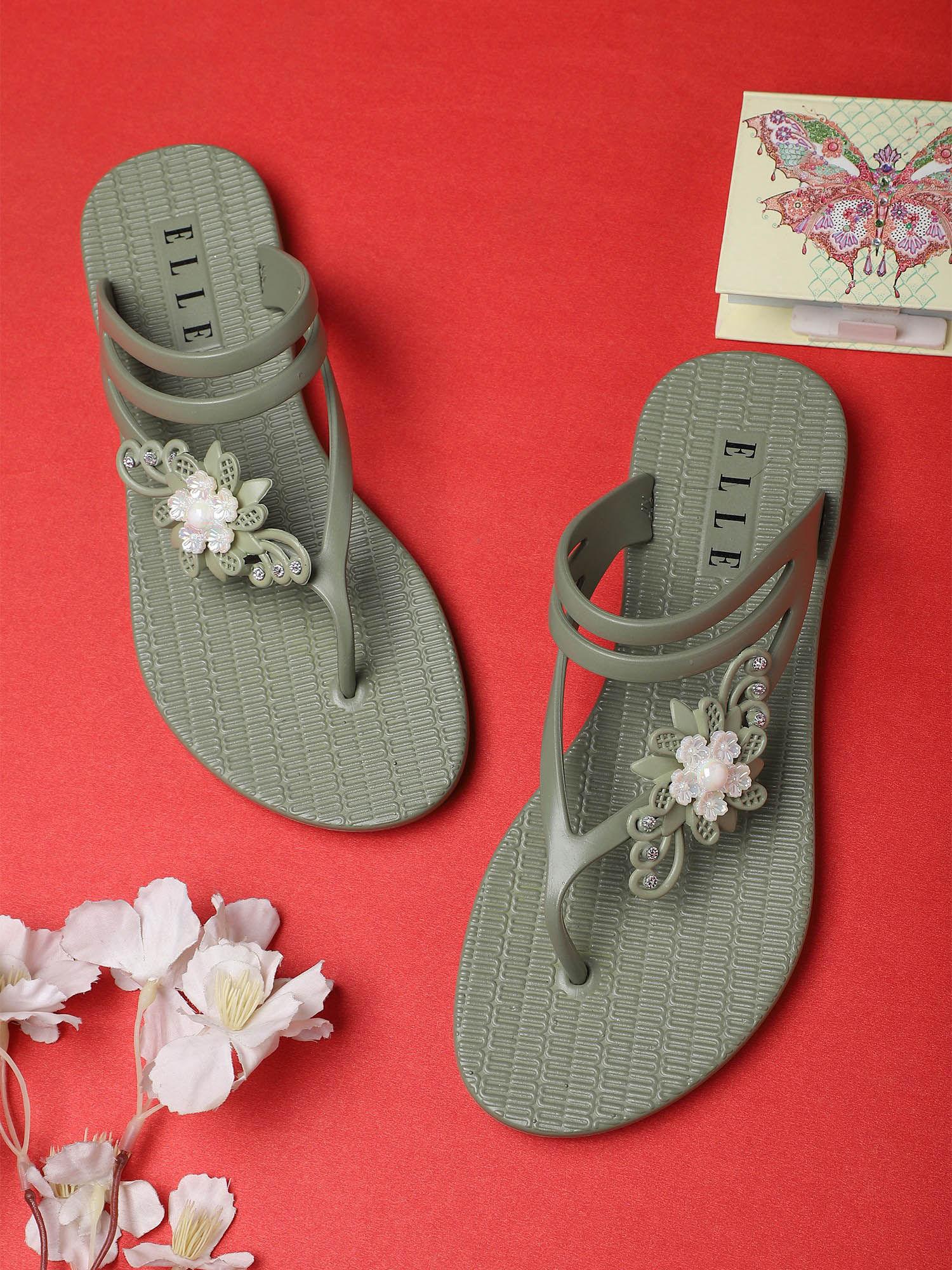 green women slip on flipflops