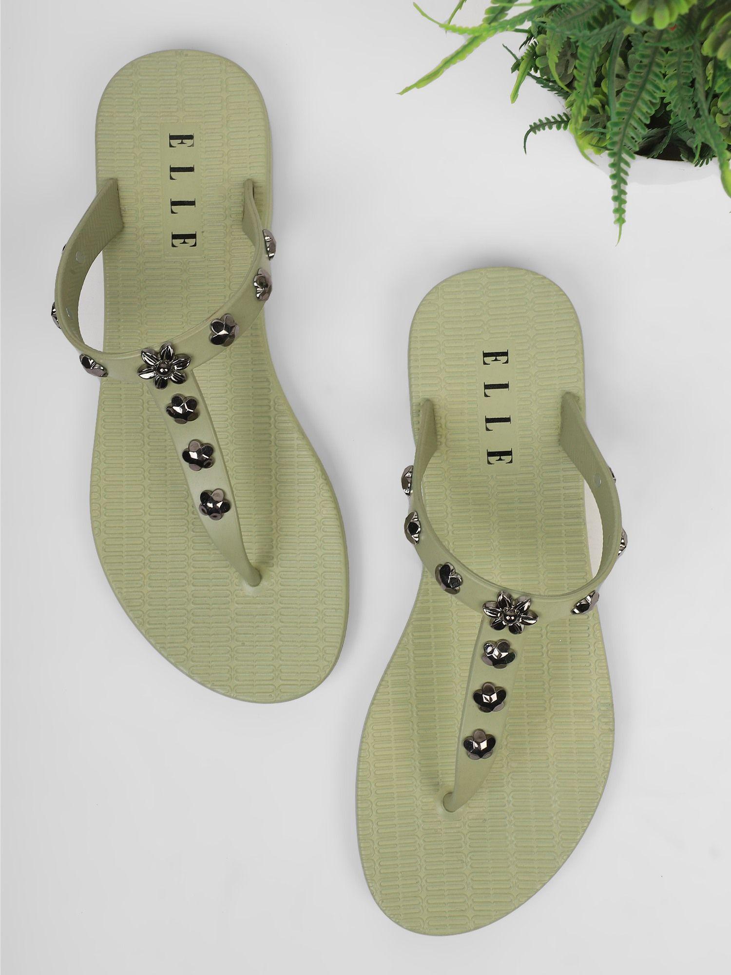 green women slip on flipflops