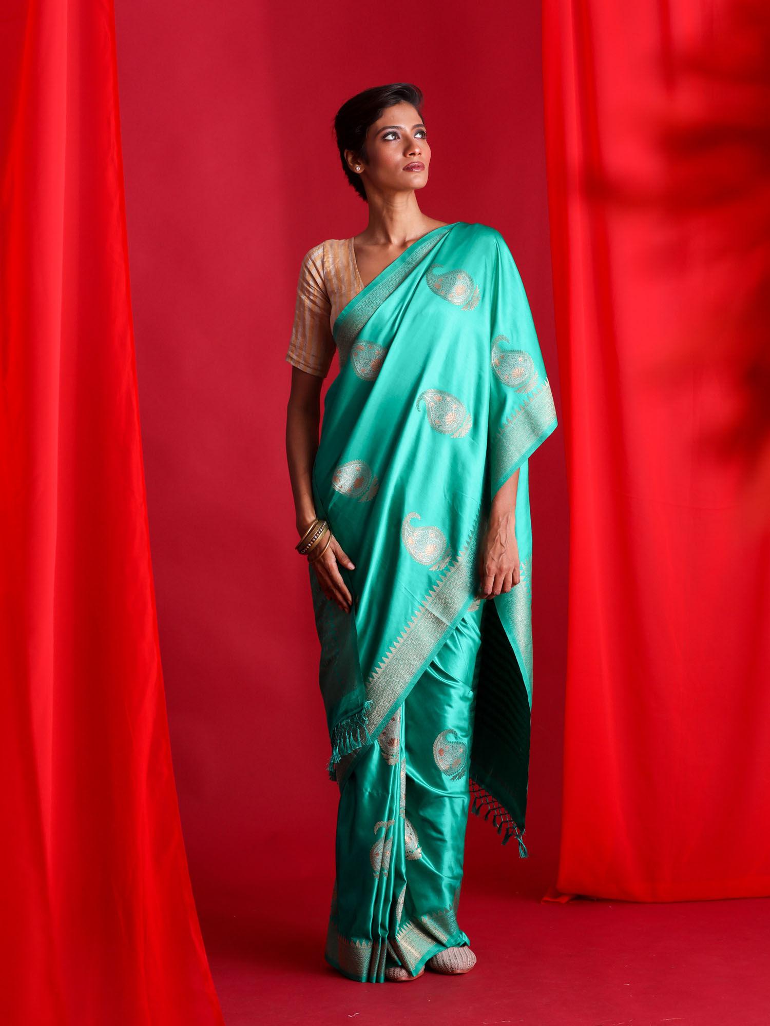 green woven banarasi saree with unstitched blouse