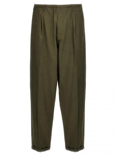 green wrinkled pants