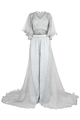 grey ruffled crop top with palazzo pants and cape