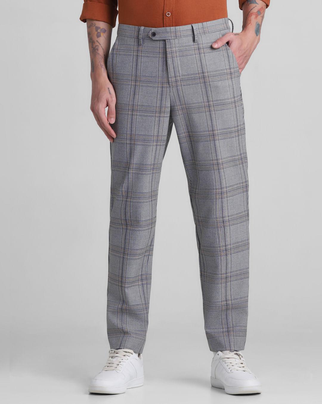 grey mid rise check print trousers