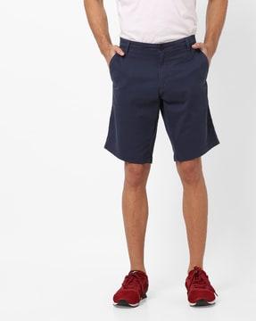 grimm mid-rise shorts with insert pockets