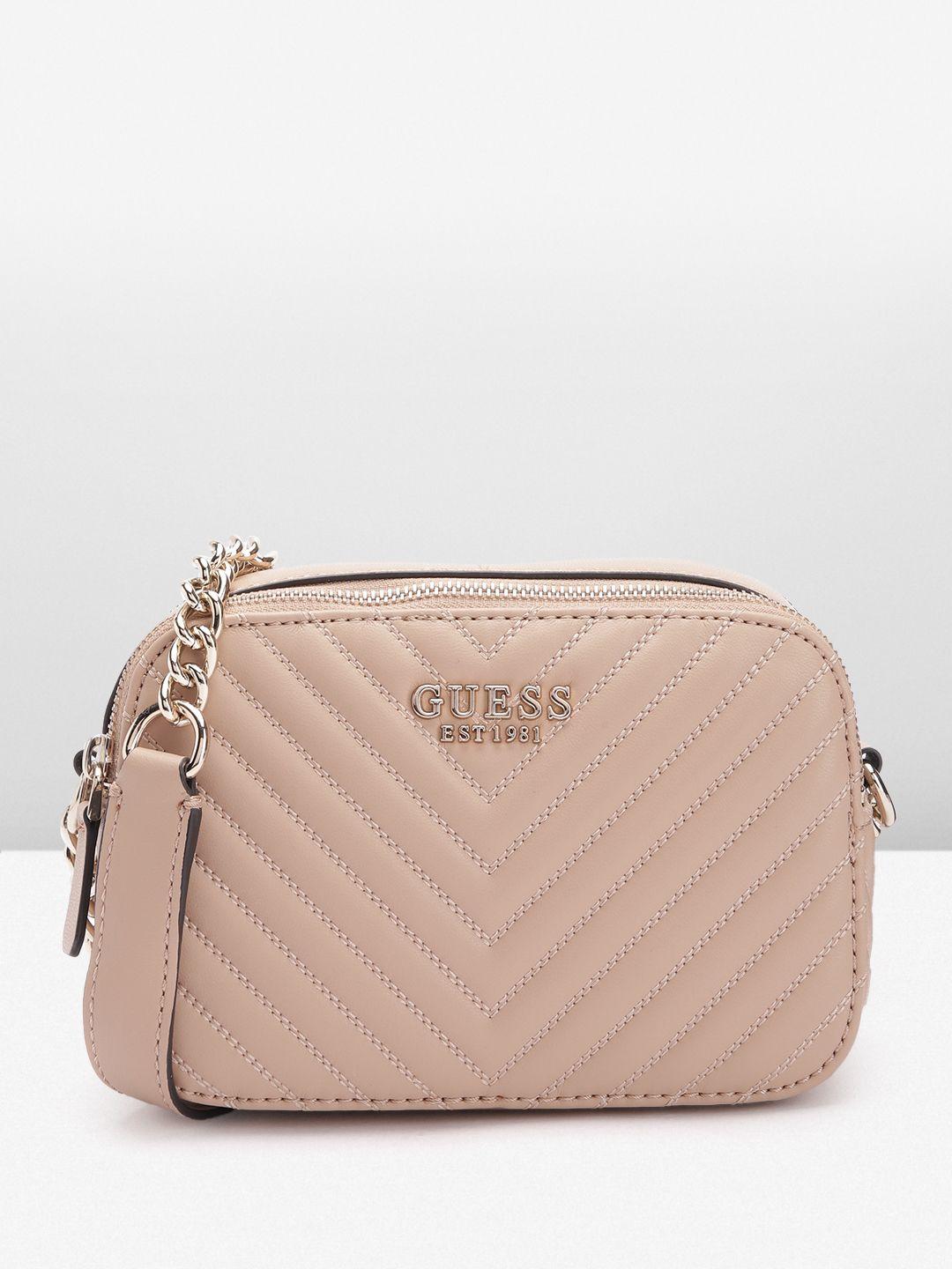 guess structured sling bag with quilted detail